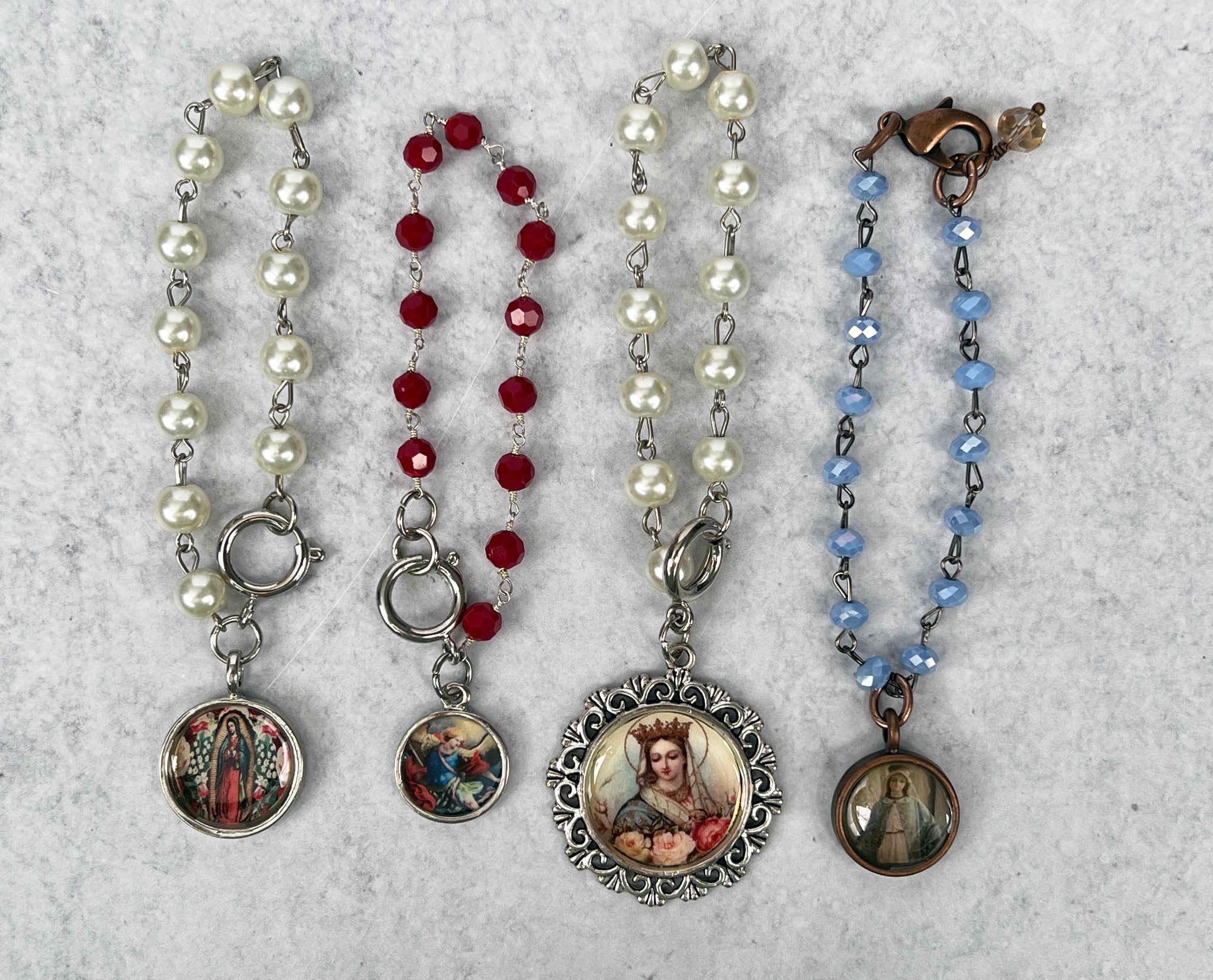 Amazon.com: WYHFA 4Pcs Wooden Rosary Jesus Bracelet Elastic Stretch Bangle  with Pictures of Religious Saints Catholic Holy Black + Brown + Wood + Wine  Red: Clothing, Shoes & Jewelry